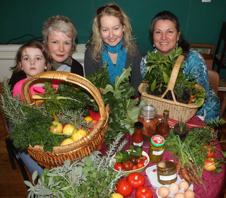  Lucinda McLean, Cath O’Brien, Loretta Gurnett and Donna Storey stock up for the Koroit Food Swap. 140616AB01 Picture: ANTHONY BRADY