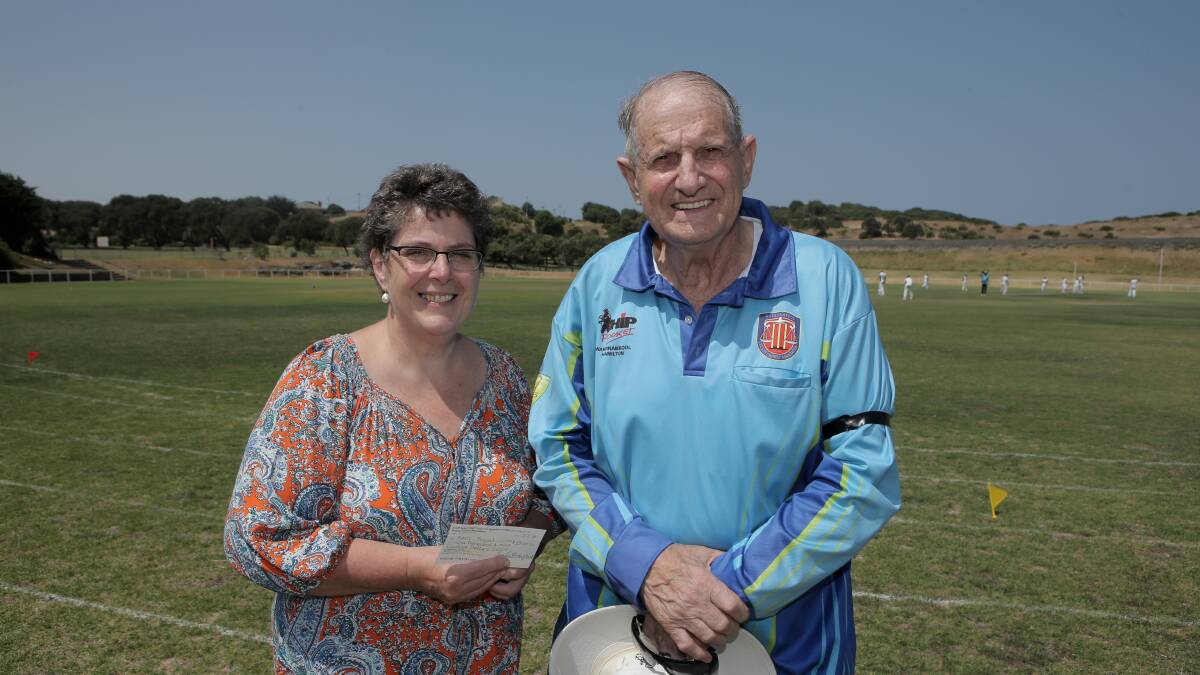Bowled over: Peter’s Project founder Vicki Jellie gratefully accepts the $1900 donation by the Warrnambool Cricket Umpires Association from its president Charles Rivett.  
