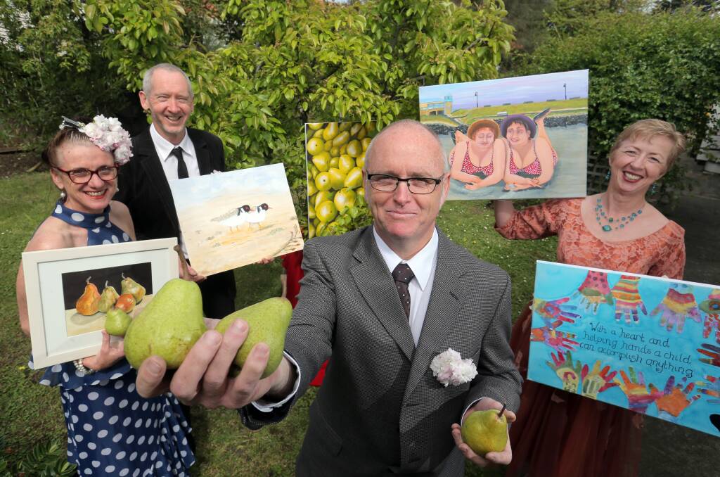 Port Fairy residents (from left) Jenny McCarthy,  Paul Burman, Mike Cornett and Cathreena Gervis have organised the ‘Pears, Pairs and Pares’ art exhibition to raise money for the Port Fairy Hospital. 141017RG04 Picture: ROB GUNSTONE