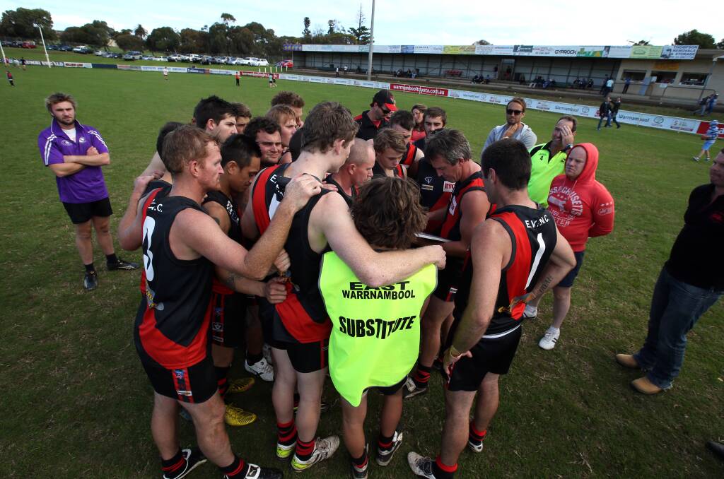 East Warrnambool coach Paul Butters addresses his troops. Butters has signed on for a fourth season in charge of the Bombers. The 37-year-old believes the youthful but steadily improving East outfit has its best football still to come. 140419DW29 Picture: DAMIAN WHITE
