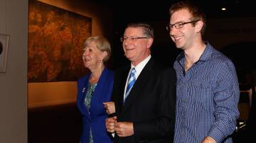 Denis Napthine enters the Liberal Party function in Melbourne with wife Peggy and son Tom. Photo: THE AGE