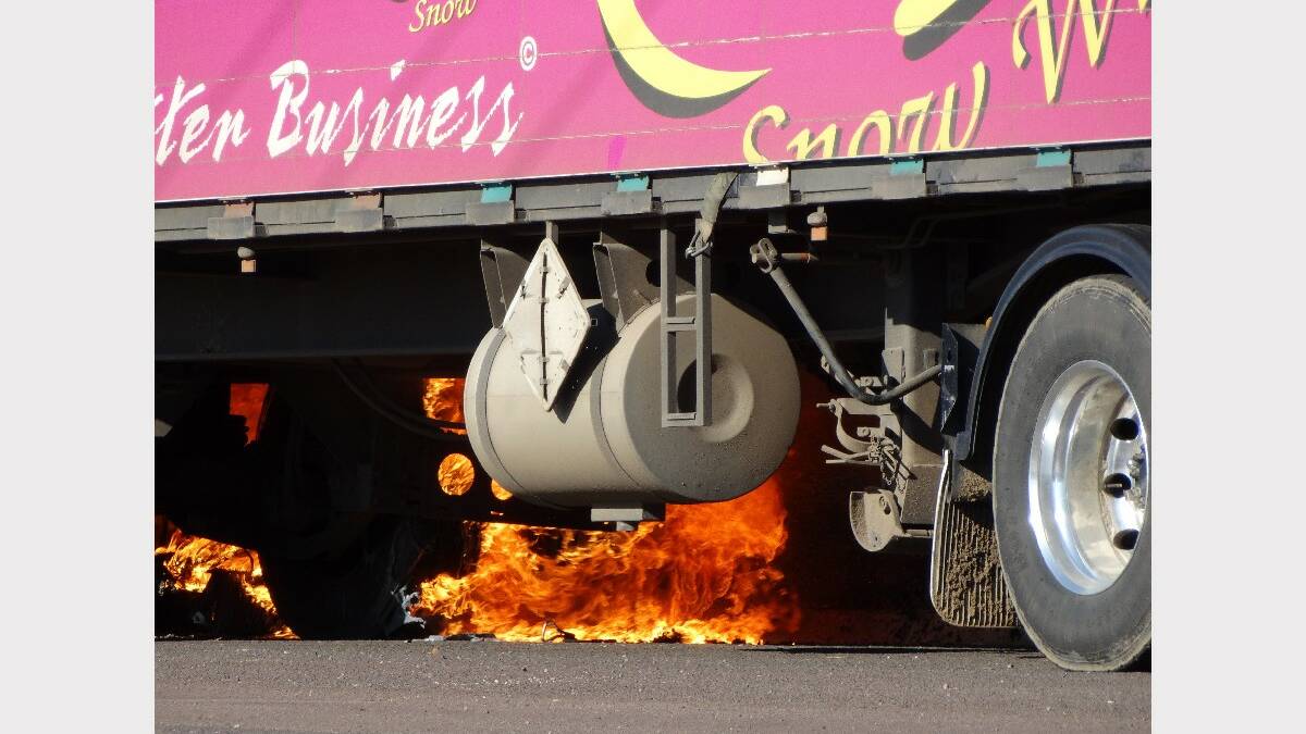 Flames engulf the bottom of a truck parked in Penshurst on Sunday afternoon. Photo: Tracey Kruger