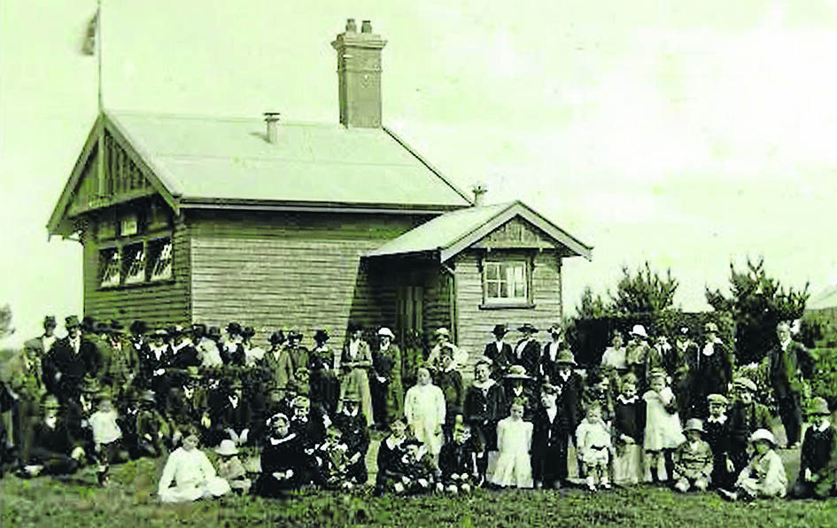 Gnotuk State School, circa 1917-20, with headmaster Gerard Reidy first on the right.