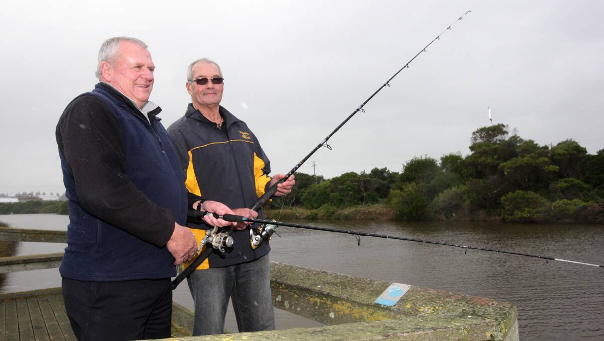 Robert O’Neill and Barry Johnson, of the Warrnambool angling club, at the proposed fishing pontoon site. 