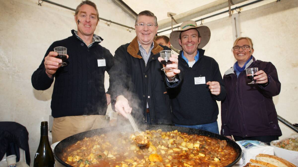 Victorian Premier Denis Napthine (second from left) with Shane Clancey (left), “Hoges” Hogan from Basalt Beef, and Thea Royal from Shaw River Buffalo Cheese, cooking up a plan to promote produce and cuisine in the Port Fairy region. 