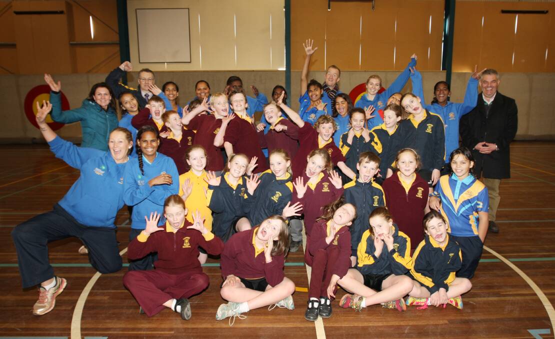 Visiting indigenous girls from Halls Creek in north-west Western Australia with grade 3 and 4 pupils at Mercy Regional College. 140818AM02    Picture: ANGELA MILNE