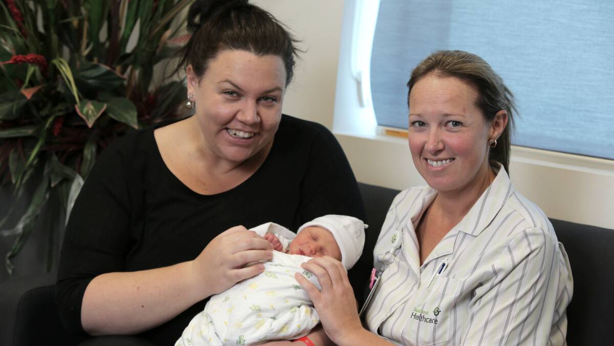 New mum Melissa Ford, of Portland, and South West Healthcare midwife Michelle Osbourne with the product of their shared labours, baby Nelly Mae. 