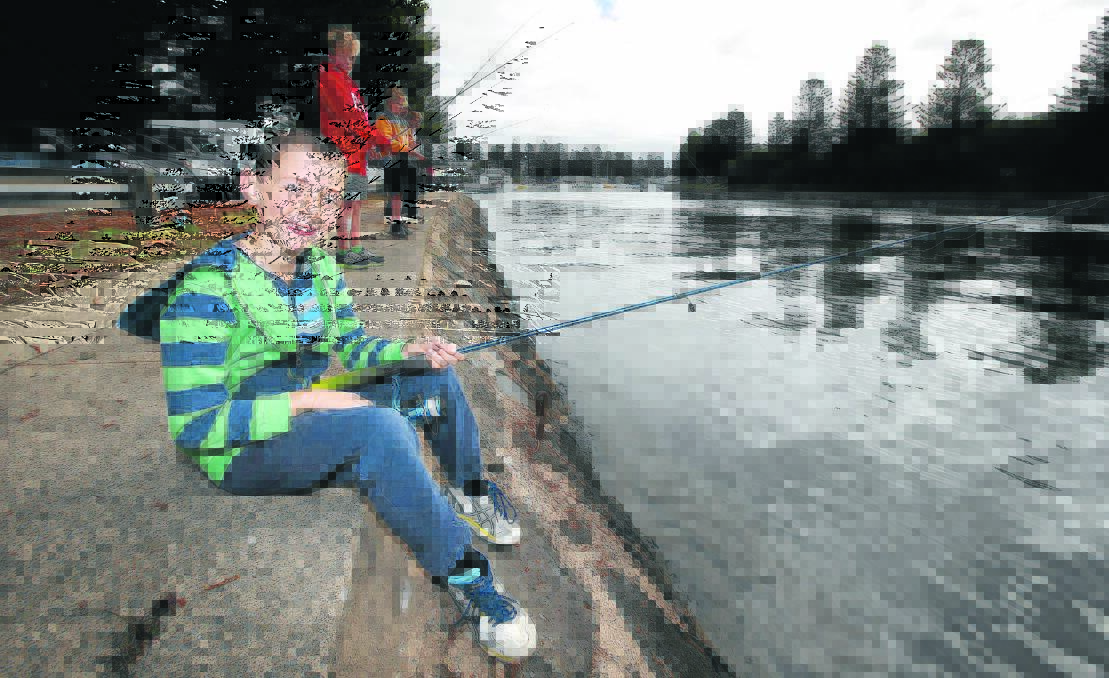 Ballarat’s Connor Harwood, 8, learns how to fish responsibly at Saturday’s junior fishing clinic run by the Port Fairy Angling Club. Picture: DAMIAN WHITE