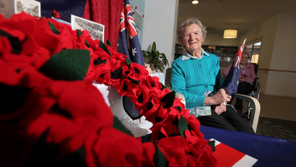 Norma McDowell, 84, at the tribute created by Mercy Place residents for war veterans, such as her late husband Alex.  Picture: AARON SAWALL