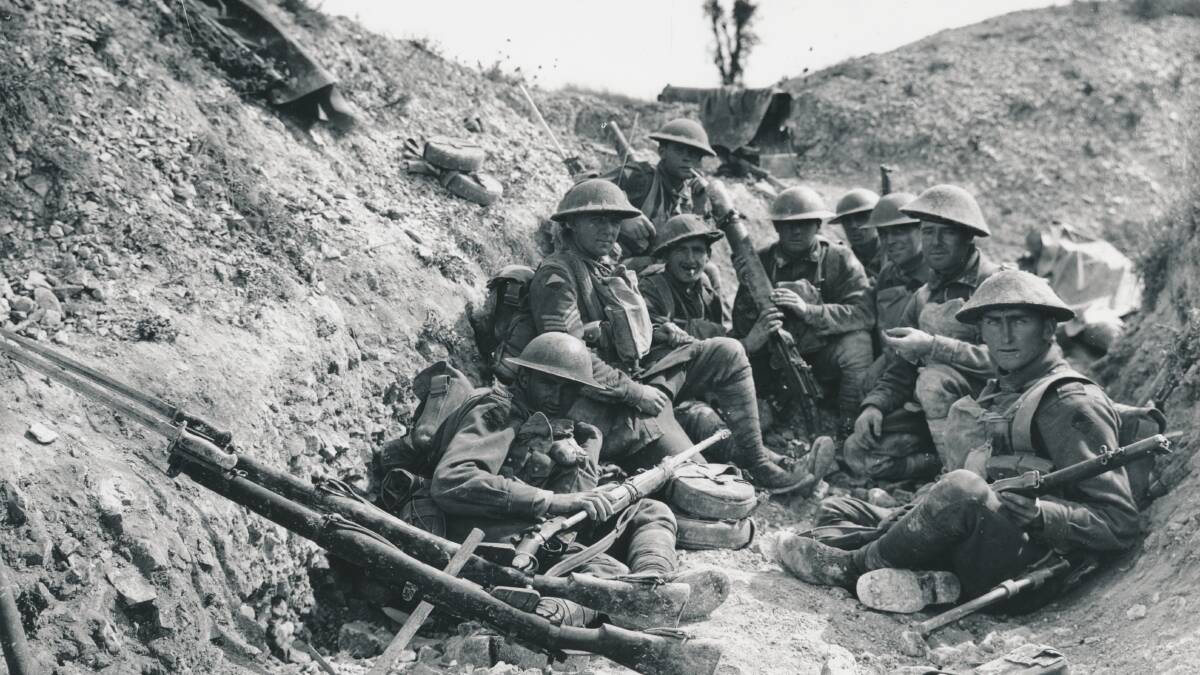 More than four years after the war began, Australians of the 24th Battalion prepare to attack Mont St Quentin on September 1, 1918.  
Picture: Australian War Memorial