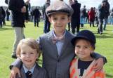 Dressed to impress: Eddie, 4 (left), Chas, 9, and Harriet Williams, 6, all from Adelaide, made a special effort for day two of the May Racing Carnival. 
150505RG24  Picture: ROB GUNSTONE