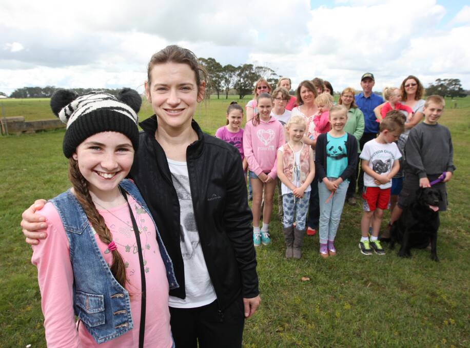 Twelve-year-old Ella Pattison with organiser Brooke Dean, who has the Laang community registered as a team to take part in the Walk to Cure Diabetes and raise money for research.   Picture: AARON SAWALL
