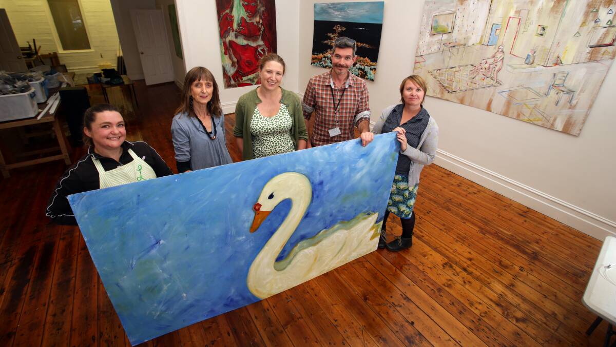 Artists Lynn Mast, Helen Bunyon, Tonia Wilcox, Gareth Colliton and Megan Nicholson behind Megan's painting title Grandma"s Swan before The Artery opening.  Picture: DAMIAN WHITE
