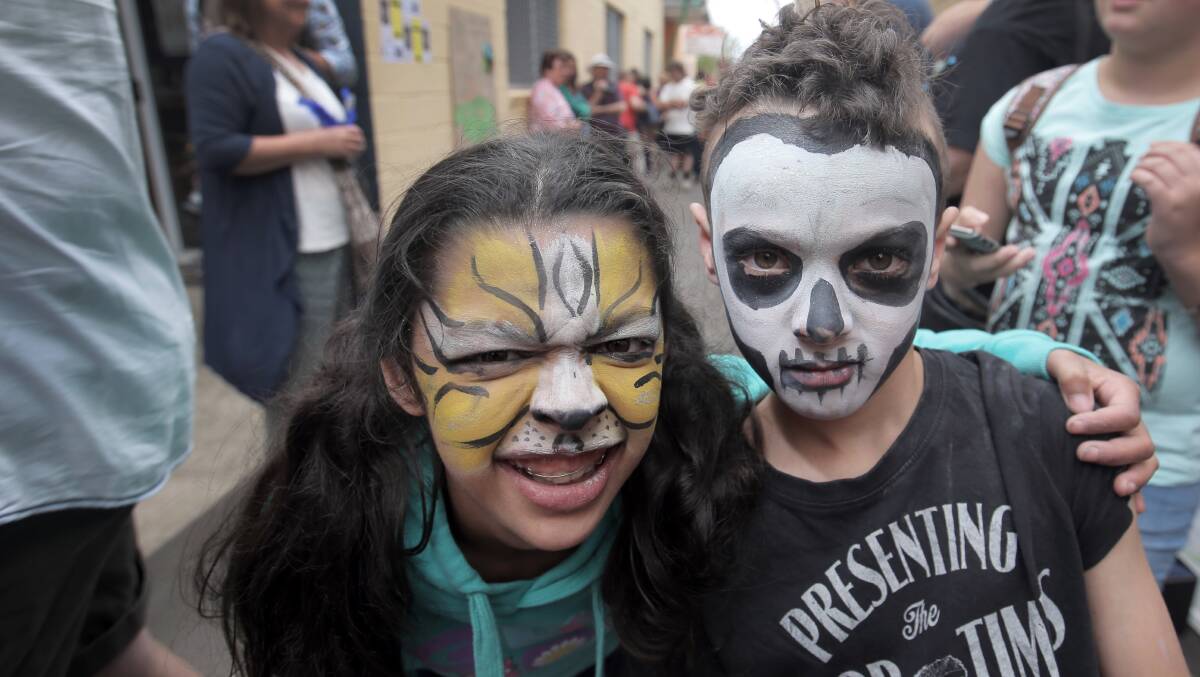 Aaliea, 9, and Nigel Cooper-Stevenson, 8, both of Hawksdale, painted up for the Laneway Festival.