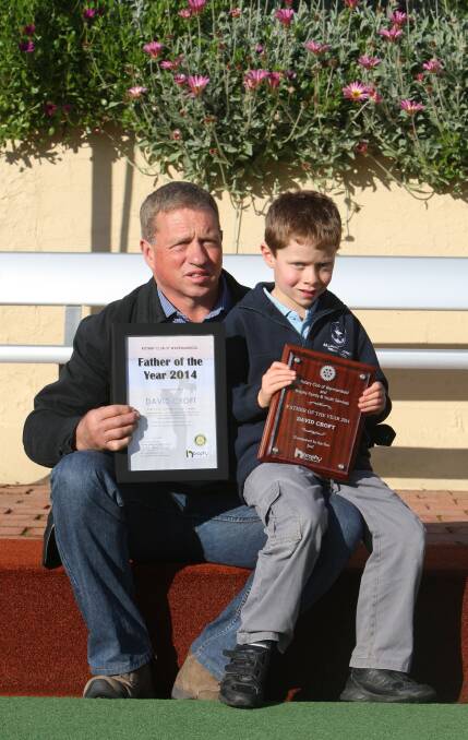 Father of the Year and Mepunga East dairy farmer David Croft with son Joel, 7.