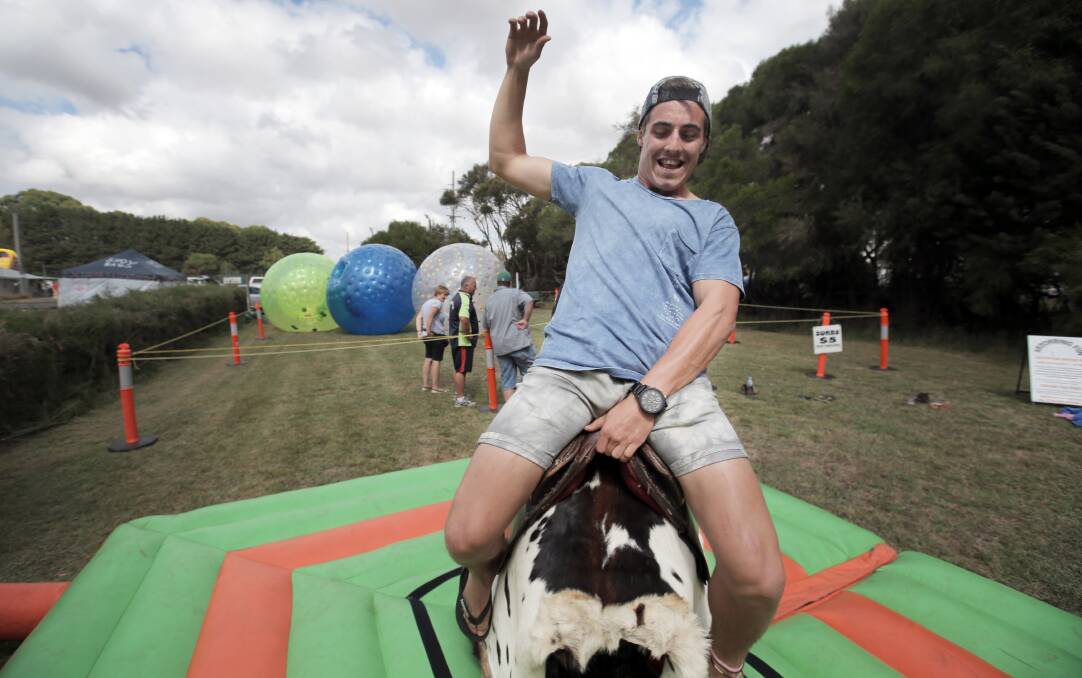 Taylor Vaughn, of Portland, shows off his bull riding style at the Heytesbury Show. Picture: ROB GUNSTONE