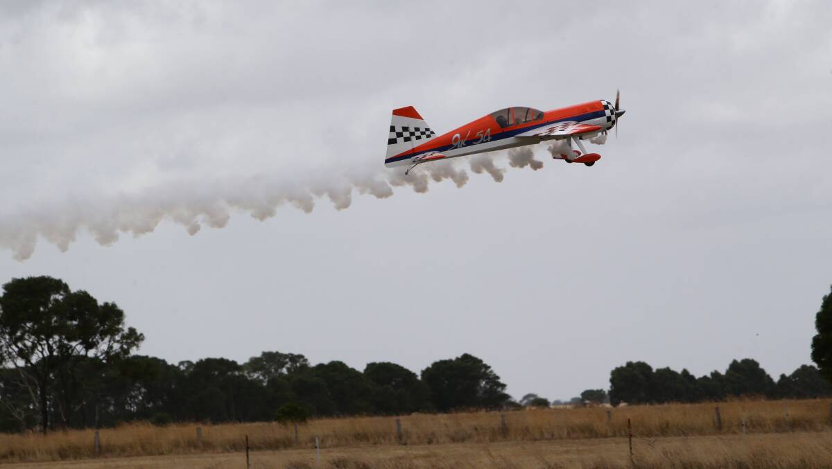 Yak 54 with smoke, flown by Peter Stefurak from Melton, in the Warrnambool Model Aircraft Club annual fun fly at Koroit. Picture: AARON SAWALL