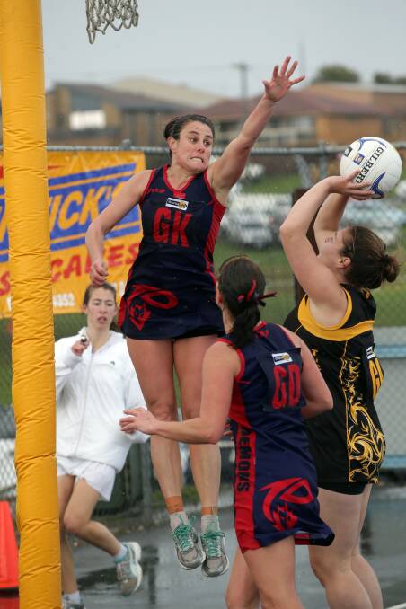 Timboon's Prue Hunter attempted to block Merrivale player Raewyn Poumako's shot for goal during the WDFNL elimination final. Picture: DAMIAN WHITE