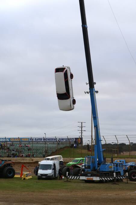 The crane drop in the Monster Truck show at the Sungold Stadium. Picture: AARON SAWALL