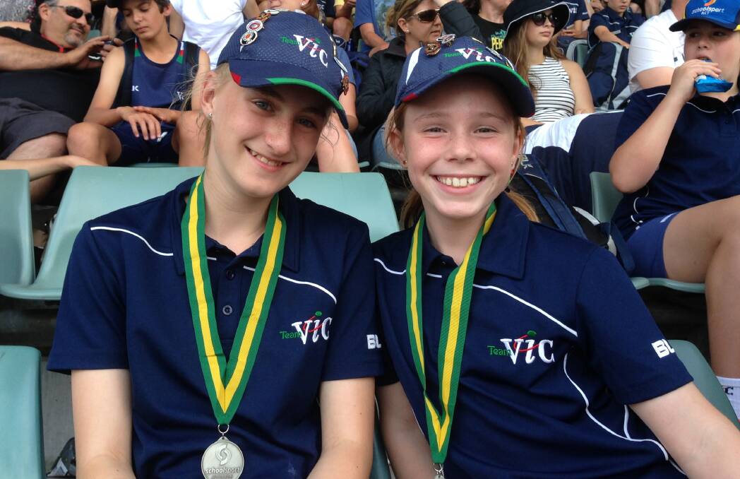 SHINING STARS: Layla Watson and Grace Kelly both claimed silver medals in their respective 4x100m relay races at the School Sport Australia championships.