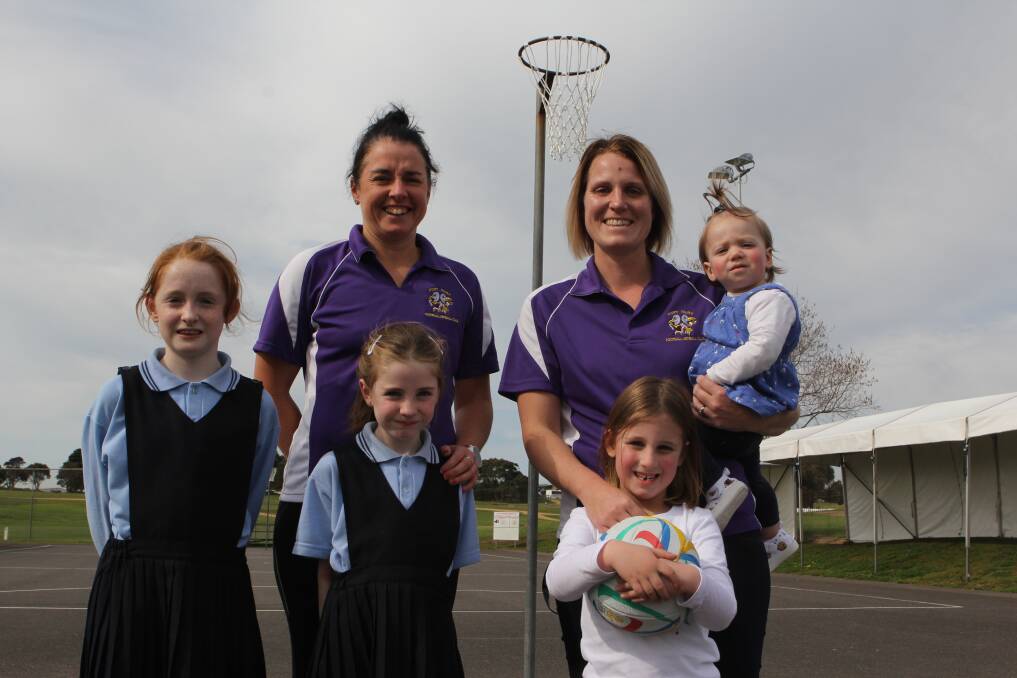 FAMILY CLUB: Port Fairy division one coaches Leah Kermeen and Rhiannon Cuomo with their children Paige, 9, and Chloe Kermeen, 6, and Indiana, 5, and Harper Cuomo, 1.