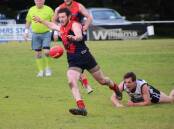 CHARGING IN: Lismore-Derrinallum's Brandon Greenwood gets a kick away during the qualifying final. His Demons take on Wickliffe-Lake Bolac again in the decider. Picture: Tracey Kruger