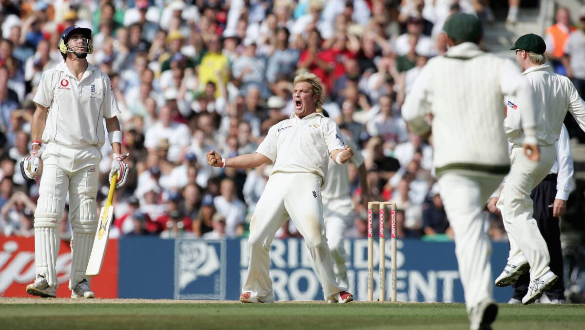 Shane Warne celebrates the wicket of Andrew Flintoff on day five of the fifth Ashes Test in 2005. Picture: Getty Images