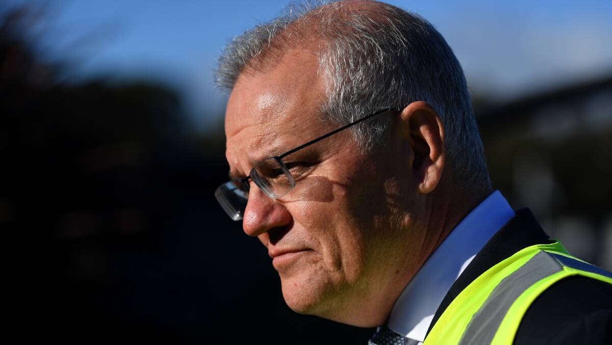 Prime Minister Scott Morrison visits a Tasmanian paving business on day 39 of the campaign. Picture: AAP