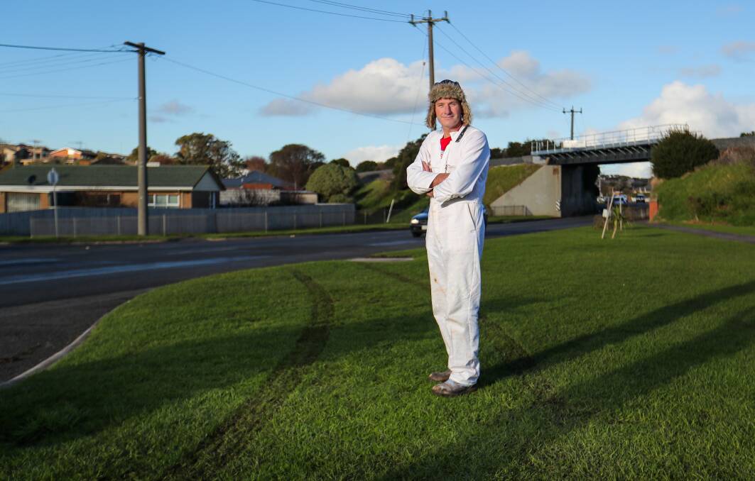 WHEELIE BAD: Phil Hoye stands on his nature strip in between the marks left by thieves as they drove away in his ute. Picture: Morgan Hancock