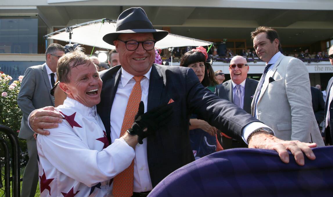 Double up: Jockey Barend Vorster with trainer Tony McEvoy after Sunlight claimed victory in the Newmarket Handicap last month. Picture: AAP/George Salpigtidis