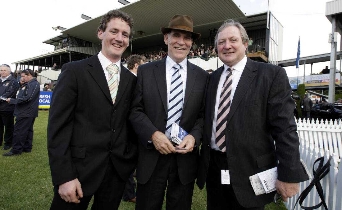 HISTORIC: Former Racing Victoria chief steward Des Gleeson (centre) in 2008 with a fresh-faced mad Essendon supporter Ciaron Maher and Kevin Sheedy after Al Garhood won the Brierly Steeplechase. 