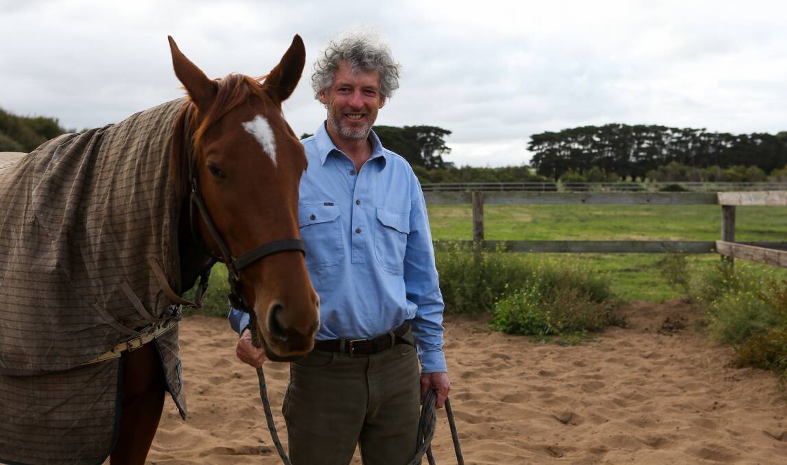 DAMAGE done: Tower Hill trainer Chris Ryan with filly Bambolina... "I don't see how I am any different to somebody who goes running on the beach, or goes surfing." Picture: Rob Gunstone