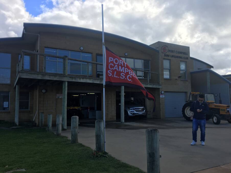 MOURNING: The Port Campbell Surf Life Saving Club's flag at half mast on Monday. Picture: Monique Patterson 