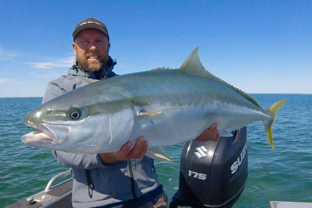 KING: Scott Gray with a big south-west king caught on a topwater lure.