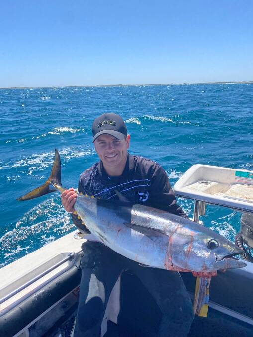 ARRIVAL: Tommy Powell is pictured with a local tuna. The much-awaited tuna has finally hit the region.