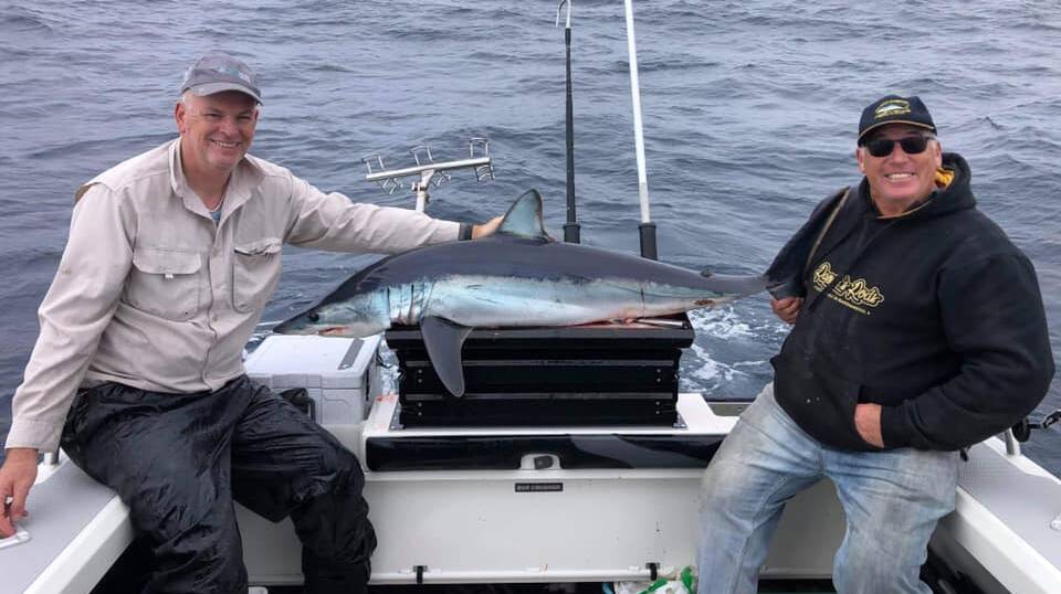 CATCH: Anthony Smith's first Mako Shark off Warrnambool. He is pictured here with his fishing mate Rhooky.