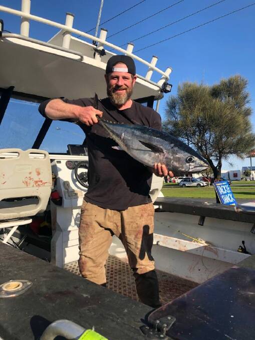 CATCH: Shaun Johnson with his first southern bluefin tuna caught off Port Fairy.