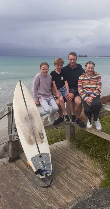 BEACH LIFE: Jarrod Gleeson with his children Esther, Fraser and Milla at Port Fairy's East Beach.