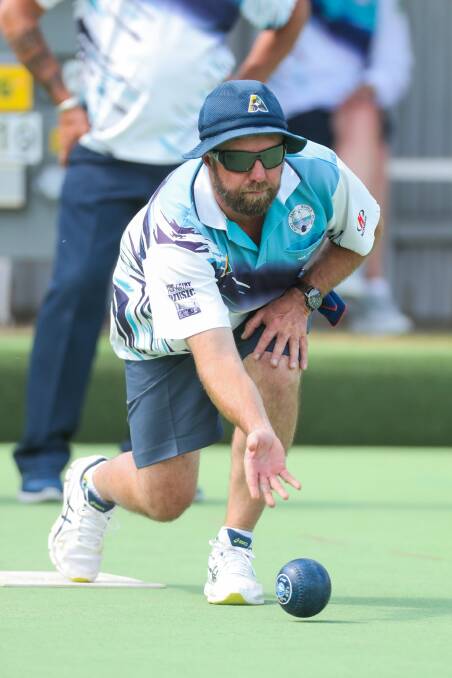 ROLL: Port Fairy's Neil Lowe rolls one down the green in weekend pennant. Picture: MORGAN HANCOCK