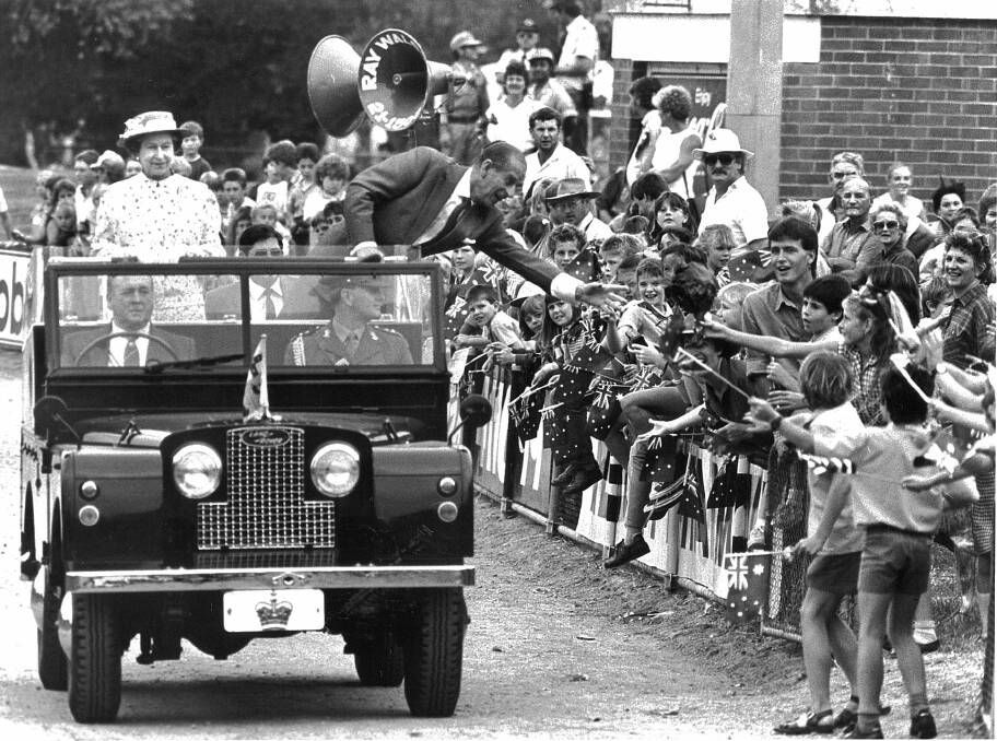 Prince Philip kids with schoolchildren in 1988 as he and the Queen parade past flag-waving crowds in Albury.