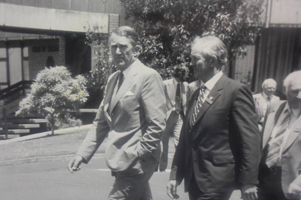 Prime Minister Malcolm Fraser with Shire of Warrnambool mayor Des O'Keefe walking across Fairy Street