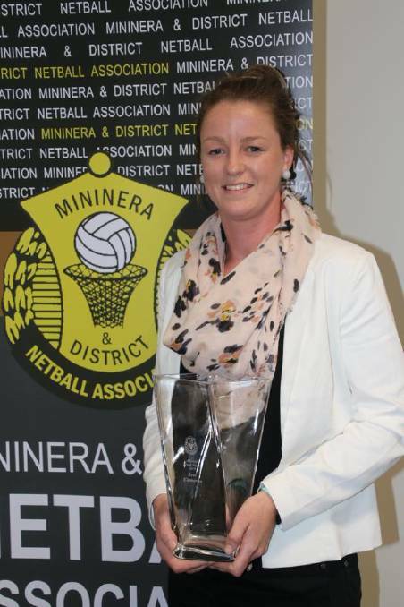IN FORM: Jess Cameron with her league best-and-fairest trophy. 