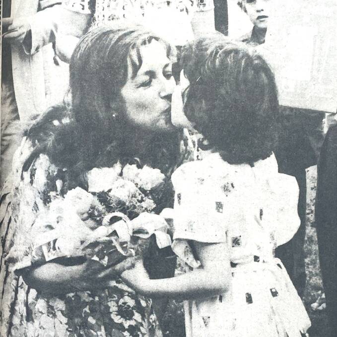 Lorraine Bayly kisses a young fan, Caroline Eccles, 6. at the Purnim Races in 1979. File Picture