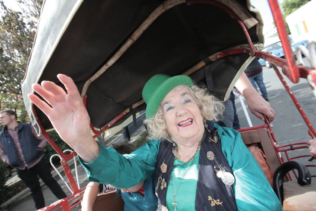 ROYALTY: The late Mary Fiorini-Lowell waves to the crowd during her annual appearance in the Koroit Irish Festival procession. The iconic Koroit resident has passed away, aged 94. 