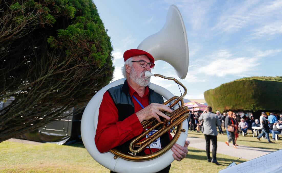 IN TUNE: Port Fairy Jazz Music Festival organiser John Huf in action at the races. 