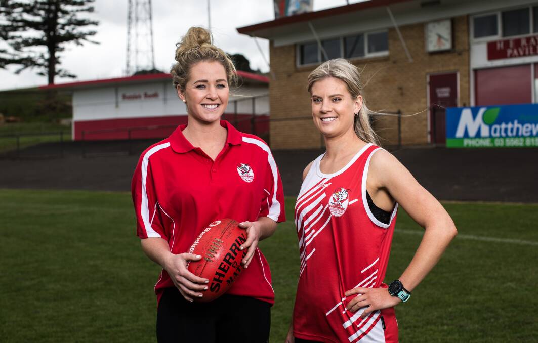 EXCITED: South Warrnambool footballers Meg Lumsden and Sarah Richards are all smiles with news of an official women's league in the south-west. Picture: Christine Ansorge