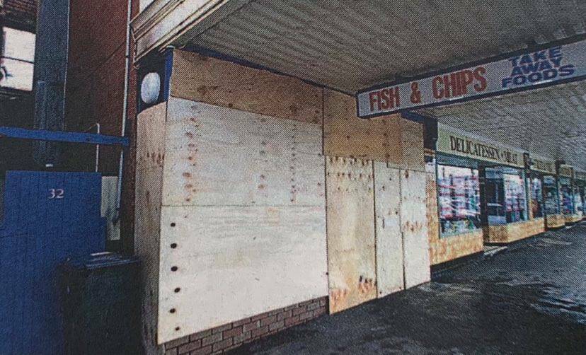 DAMAGE: The boarded up Port Fairy Fish n' Chip Shop in Sackville Street after a fire.