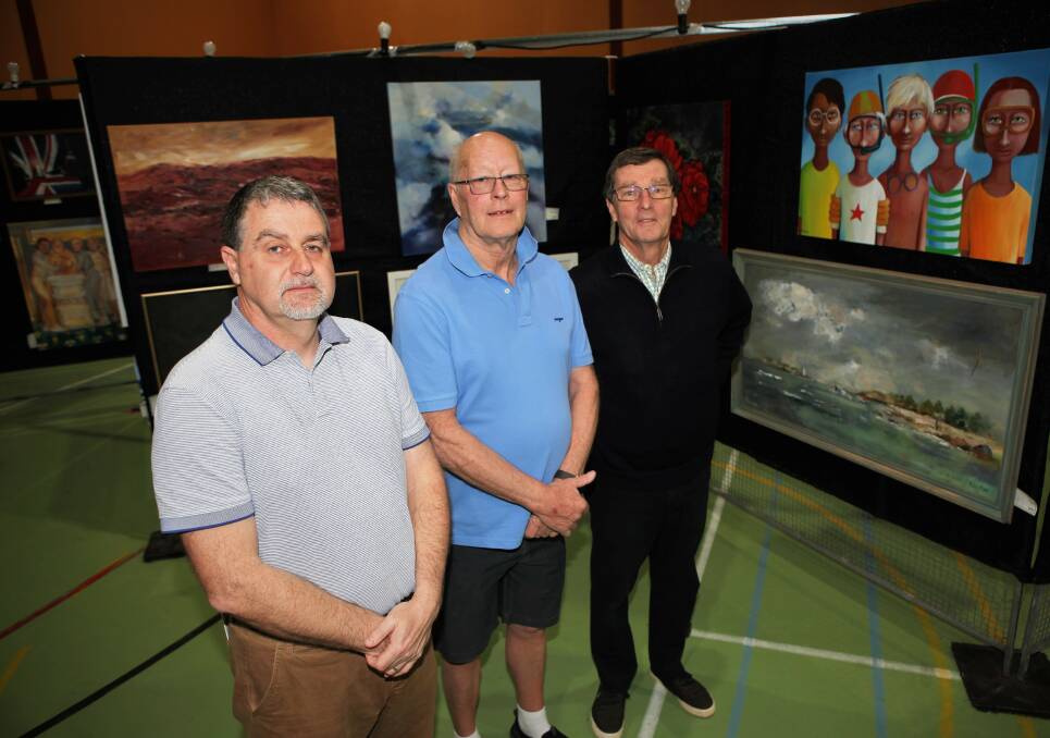 ARTISTIC: Rotary Club of Warrnambool East members Tim McLeod, Peter Hasell and Roger Cussen are ready for the annual City of Warrnambool Art Show. Opening night for the show, which is at Warrnambool Primary School, is Friday. 