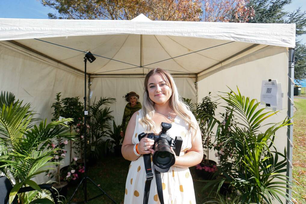 SMILE: Emma Stapleton from the Village Bakehouse in Port Fairy, who is also a talented photography student, was on camera duty at the races.