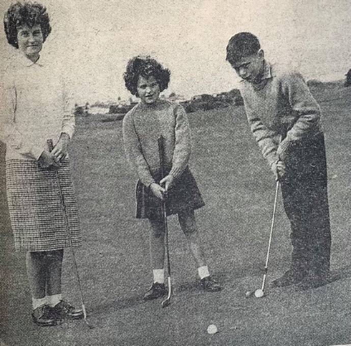 TALENT: Port Fairy's Glenn Scott (right) lines up a putt during a golf tournament in Warrnambool. 
